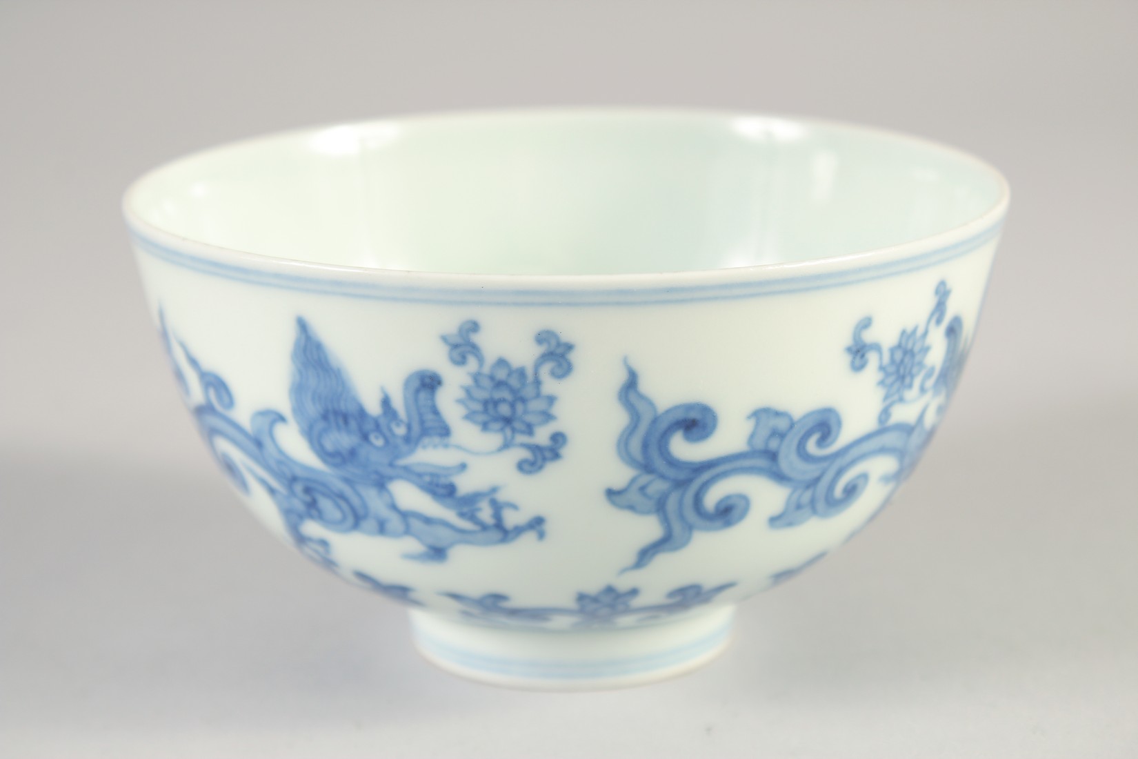 A CHINESE BLUE AND WHITE PORCELAIN BOWL, decorated with Kui dragons, six-character mark to base, - Image 4 of 6
