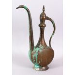 A 19TH CENTURY ISLAMIC PERSIAN TINNED BRONZE/COPPER EWER, 36cm high.