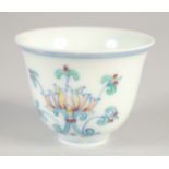 A CHINESE DOUCAI PORCELAIN CUP, with six-character mark, 6.5cm diameter.