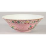 A CHINESE FAMILLE ROSE PORCELAIN BOWL, decorated with flora, the interior with five bats, four-