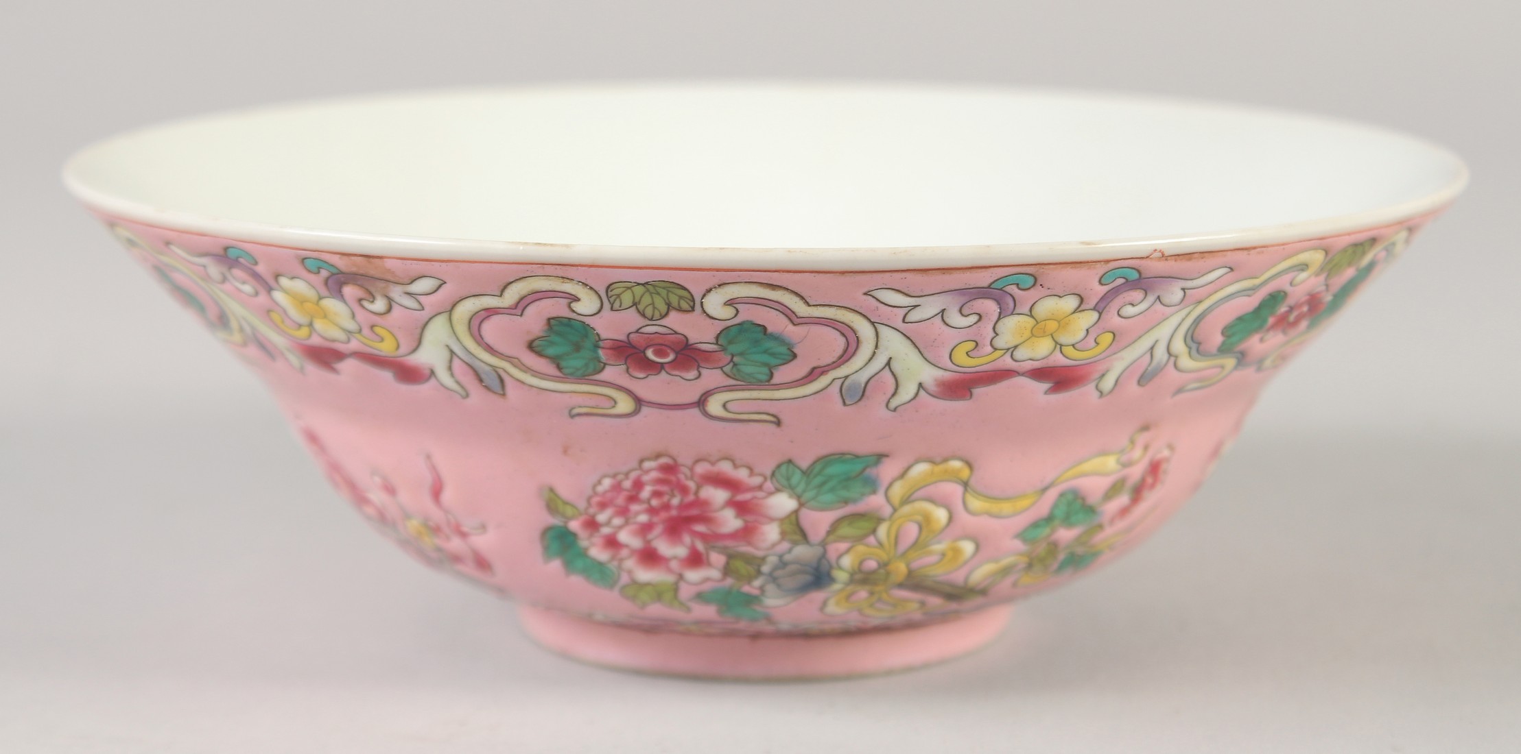 A CHINESE FAMILLE ROSE PORCELAIN BOWL, decorated with flora, the interior with five bats, four- - Image 2 of 6