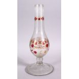 A 19TH CENTURY ISLAMIC TURKISH CUT GLASS HUQQA BASE, with floral decoration, 30cm high.