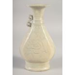 A CHINESE GLAZED POTTERY VASE, with relief decoration, (af) 23cm high.