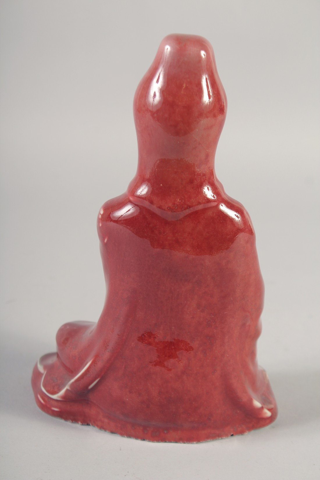 A CHINESE COPPER RED GLAZE PORCELAIN FIGURE, 21cm high. - Image 3 of 6