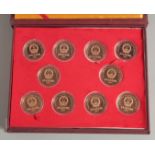 A COLLECTION OF TEN CHINESE COINS in presentation box.