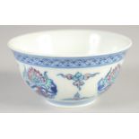 A CHINESE DOUCAI PORCELAIN CUP, painted with lotus, six-character mark to base, 7cm diameter.