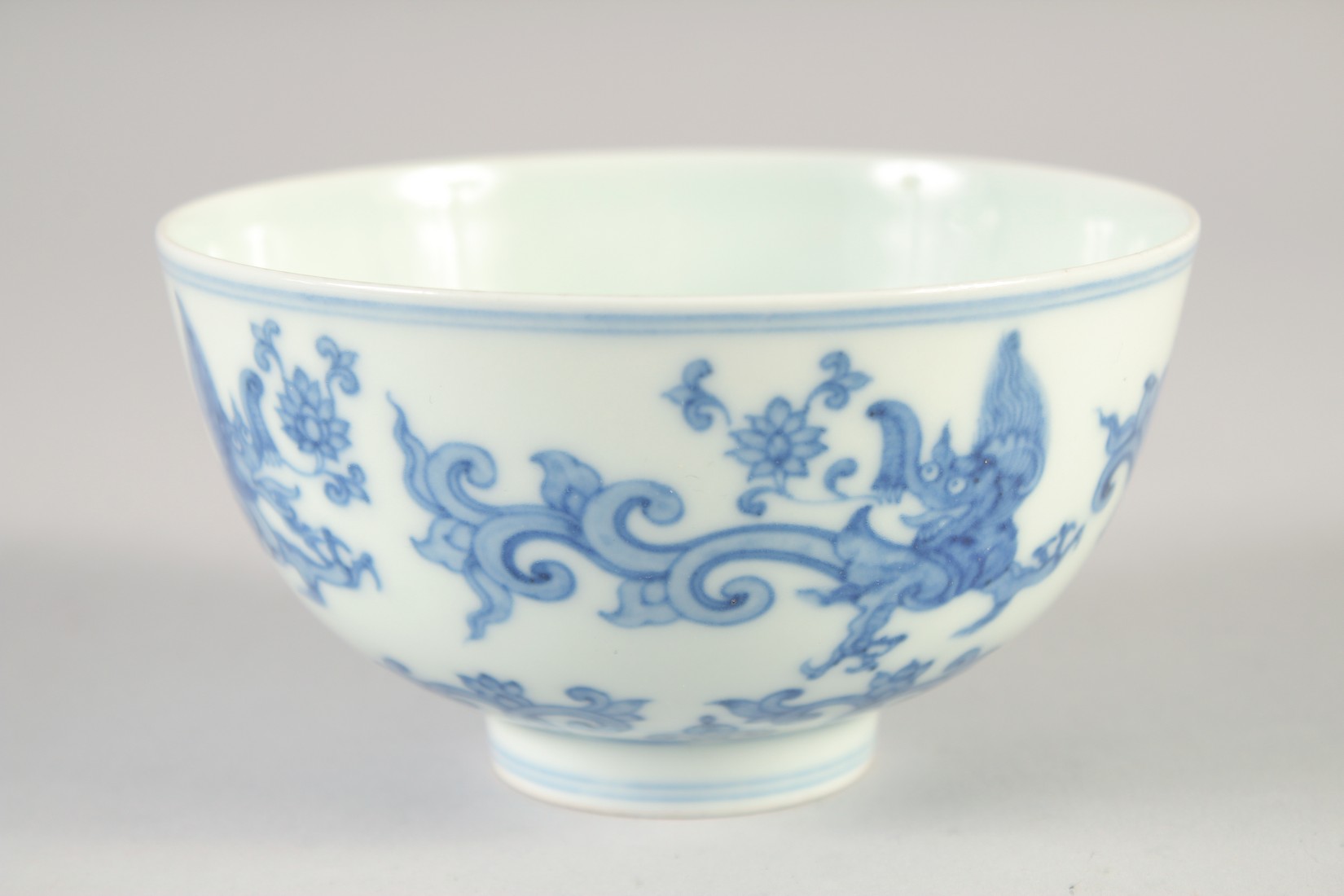 A CHINESE BLUE AND WHITE PORCELAIN BOWL, decorated with Kui dragons, six-character mark to base, - Image 2 of 6