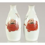 A PAIR OF JAPANESE PORCELAIN BOTTLES, 13cm high.