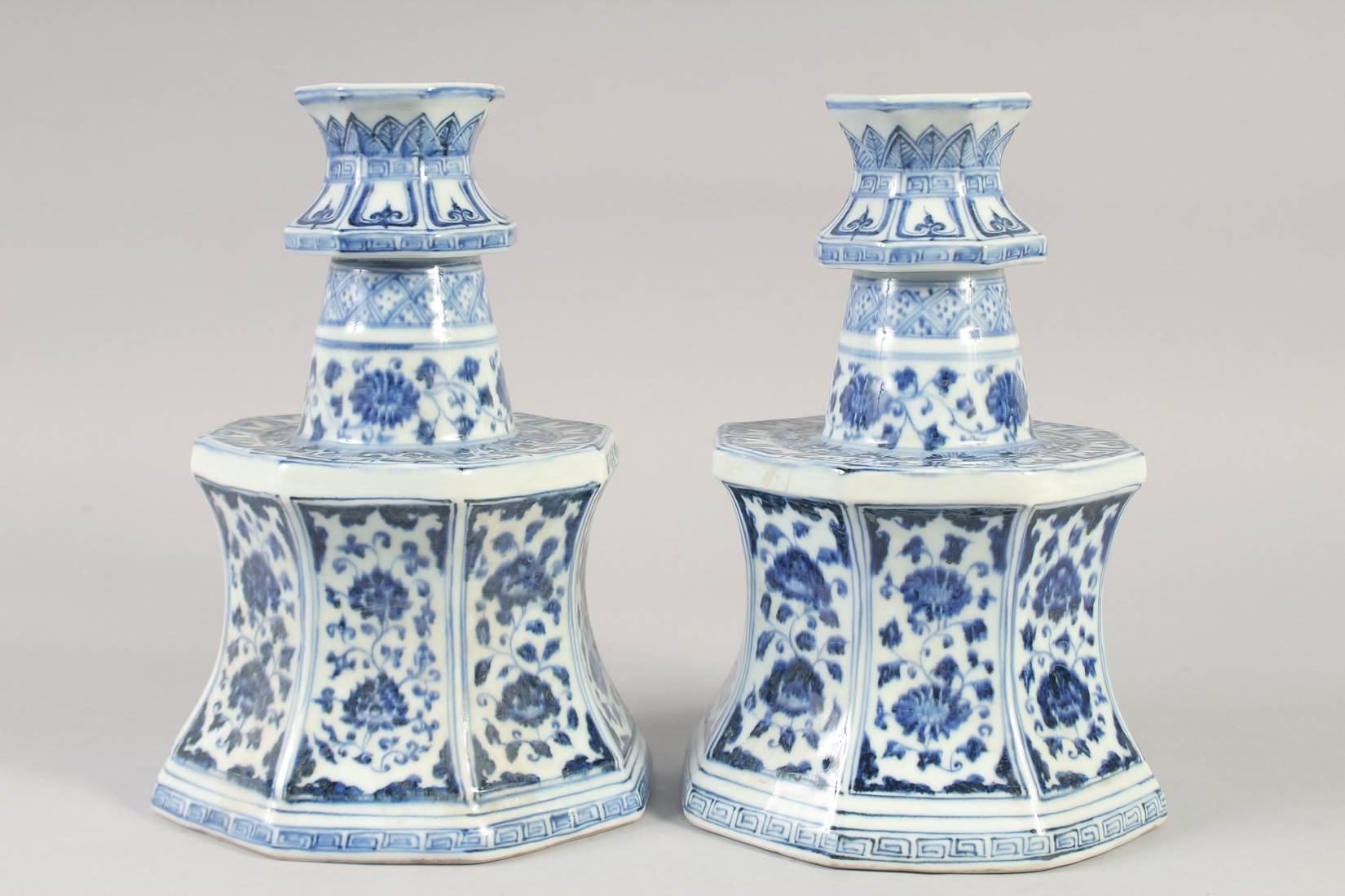 A PAIR OF A CHINESE BLUE AND WHITE PORCELAIN OCTAGONAL CANDLESTICKS, 27.5cm high. - Image 2 of 8