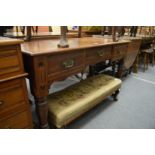 A Victorian walnut side table.