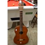 A Spanish classical guitar.