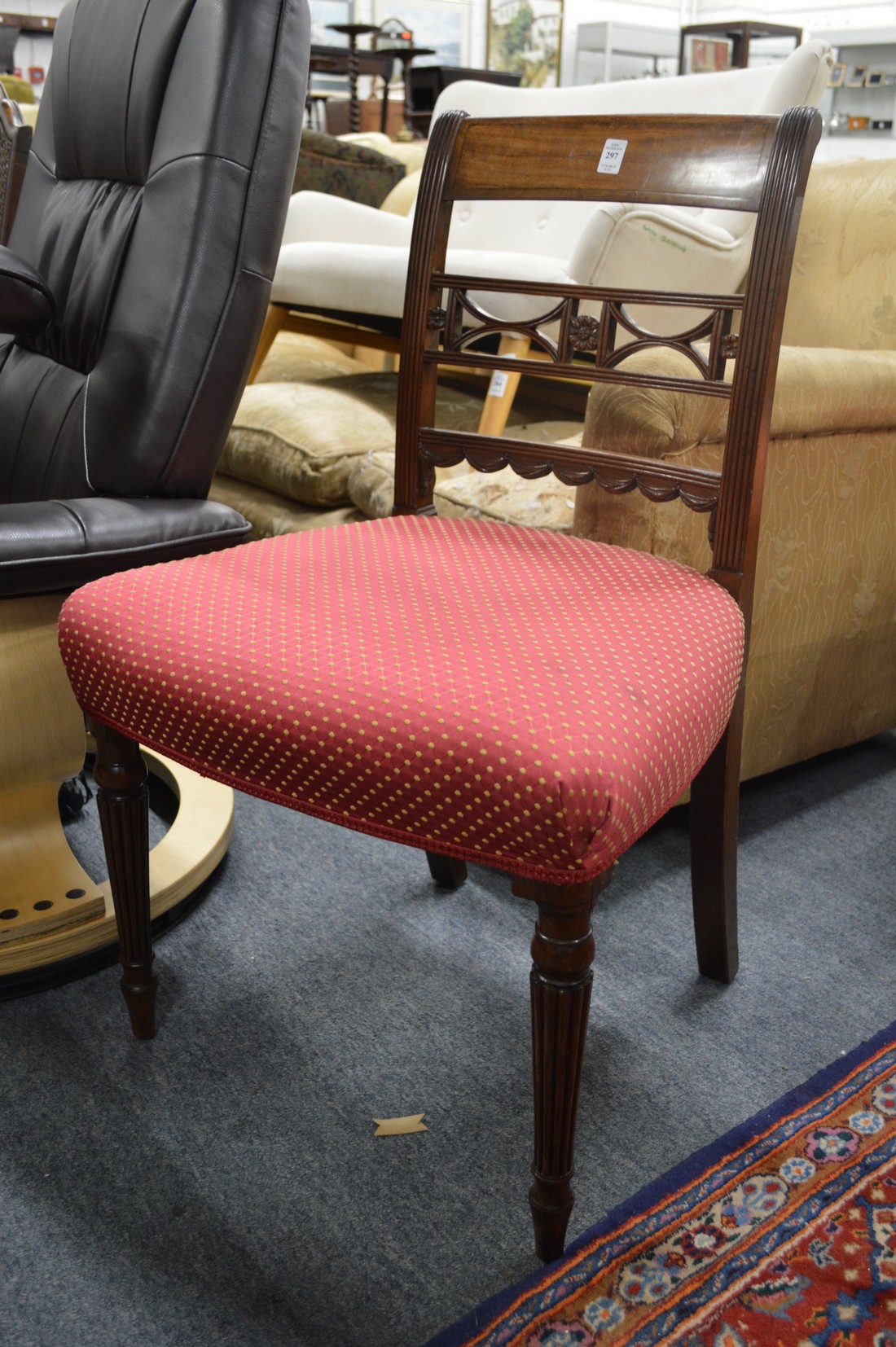 A good set of six 19th century mahogany dining chairs with pierced and carved central splat,