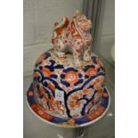 A large Japanese imari jar cover.