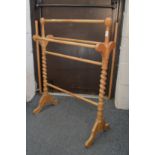 A Victorian style beech towel rail.