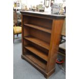 A mahogany open bookcase.