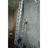 An aluminium two section ladder and two step ladders.