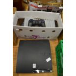 A Playstation 3 with games etc.