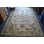 A cream ground Indian rug (worn) 275cm x 185cm.