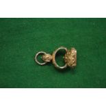 A gilt metal fob seal, matrix blank.