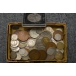 A small box of assorted coins.