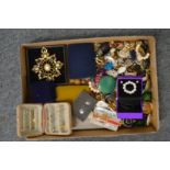 A box of costume jewellery.