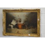 Playful terriers round a bowl, oil on canvas, in a decorative gilt frame.