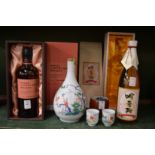 A bottle of Nikka coffee grain whisky, boxed and other items.