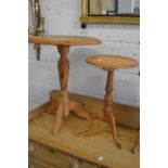 Two pine tripod tables.