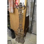 A cast iron hall stand (repaired).