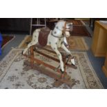 A good small Victorian painted rocking horse.