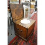 A pine box commode.