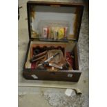 A box containing various smoking pipes etc.