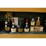 A collection of brandy to include three bottles of Courvoisier, two boxed, two one litre bottles