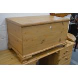 A pine blanket box.