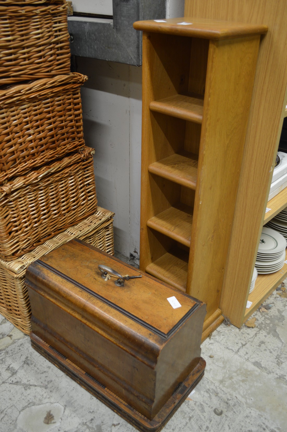 A narrow oak bookcase or CD rack and a sewing machine. - Image 2 of 2