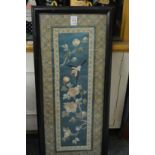 A Chinese embroidered picture, framed and glazed.