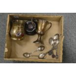 A small silver tankard and other items.