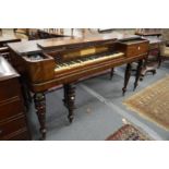 Thomas Tomkison, a 19th century mahogany square piano on turned legs with brass castors.