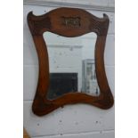 A mahogany framed mirror with pierced decoration.