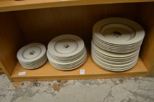 A quantity of Royal Copenhagen plates and soup bowls.
