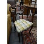 A pair of 19th century rosewood dining chairs.