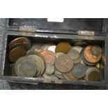 A quantity of pre-decimal and other coinage in a small lacquer box.