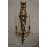 A pair of decorative gilt and mirrored two branch wall appliques.