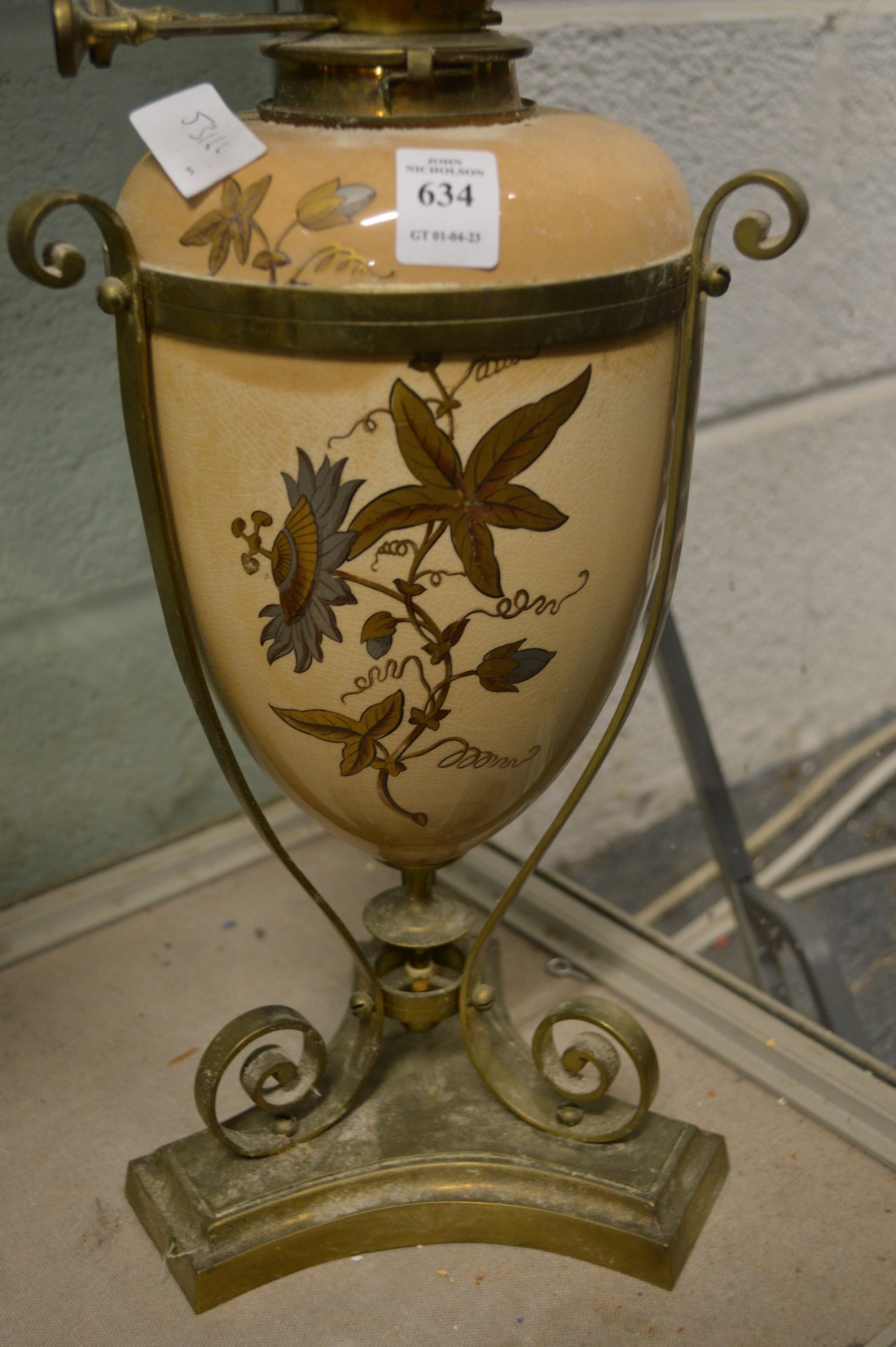 A brass and gilt decorated pottery oil lamp with decorative shade. - Image 2 of 2