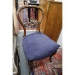 A pair of Victorian mahogany dining chairs.