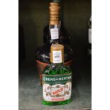 A bottle of Bols Creme de Menthe, Bols peppermint, De Kuyper Creme de Cacao and a small bottle of