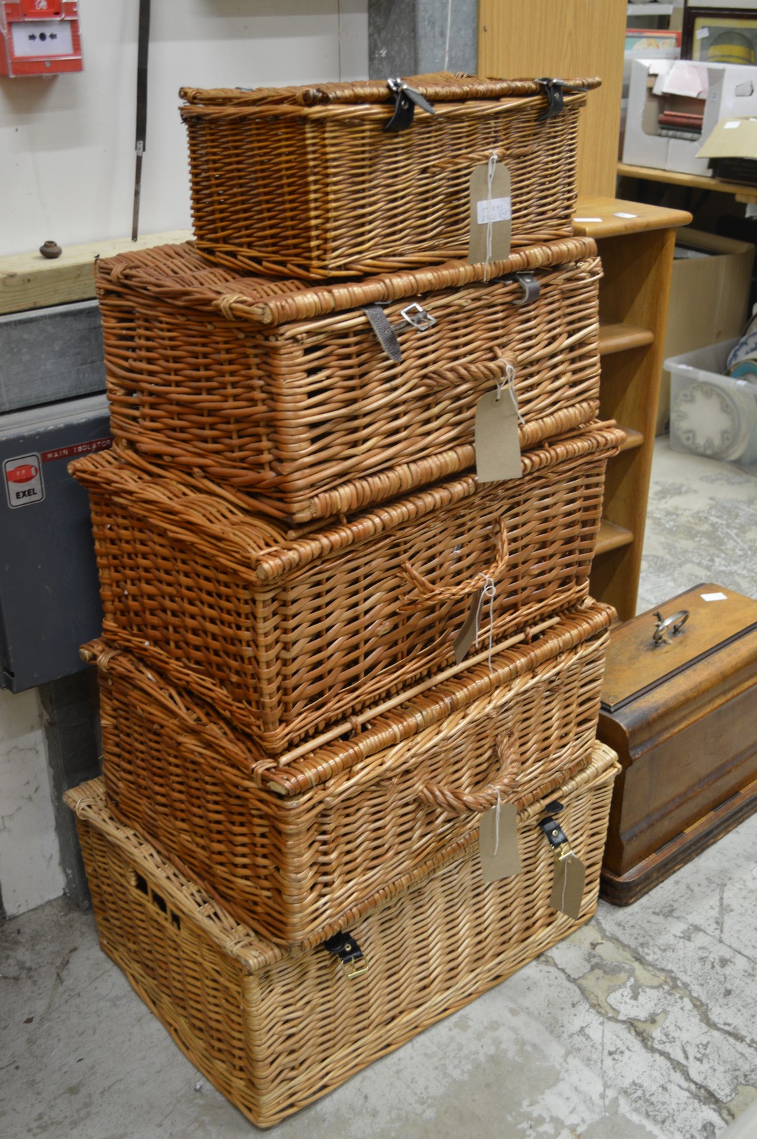 Five wicker hampers.