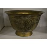 A Chinese engraved brass bowl.