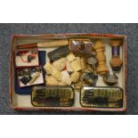 A small box of decorative items and collectables.