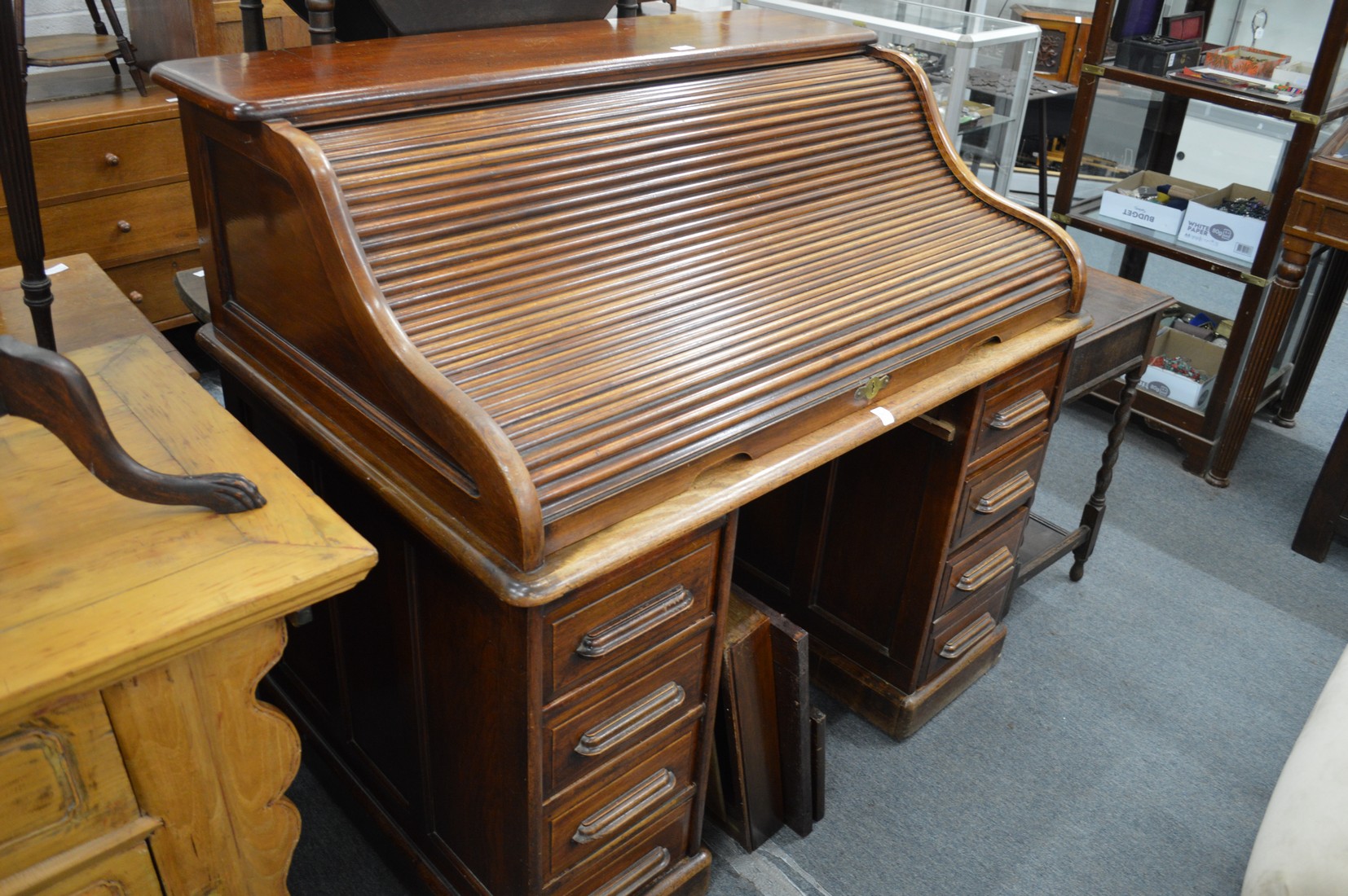 A Victorian mahogany twin pedestal roll top desk.
